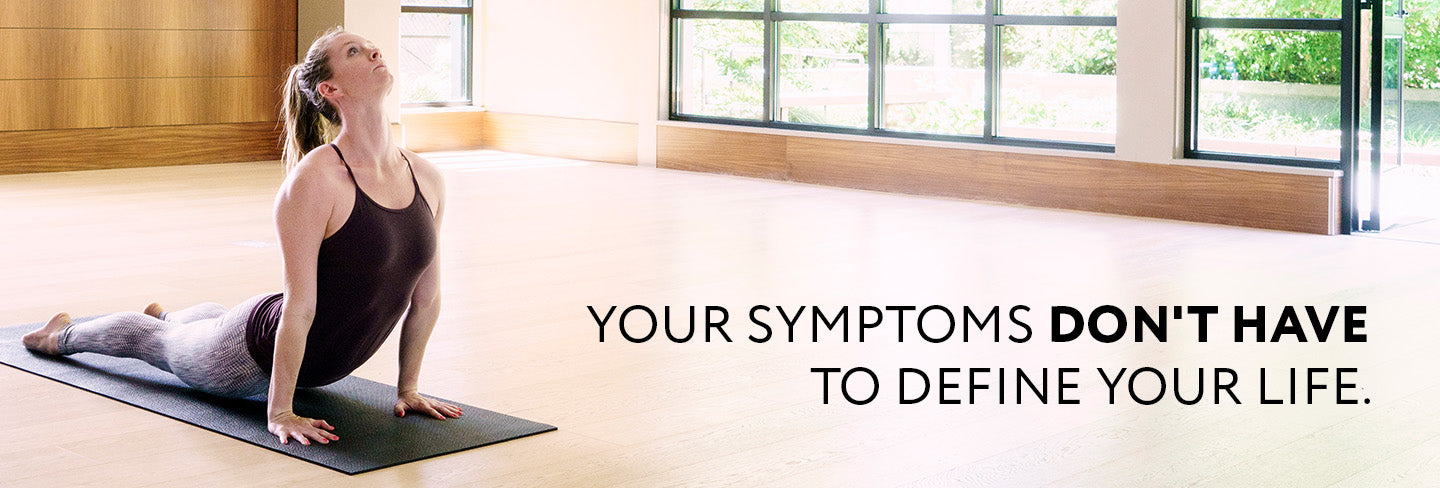 photo of a woman doing yoga with the text "your symptoms don't have to define your life." laid over it